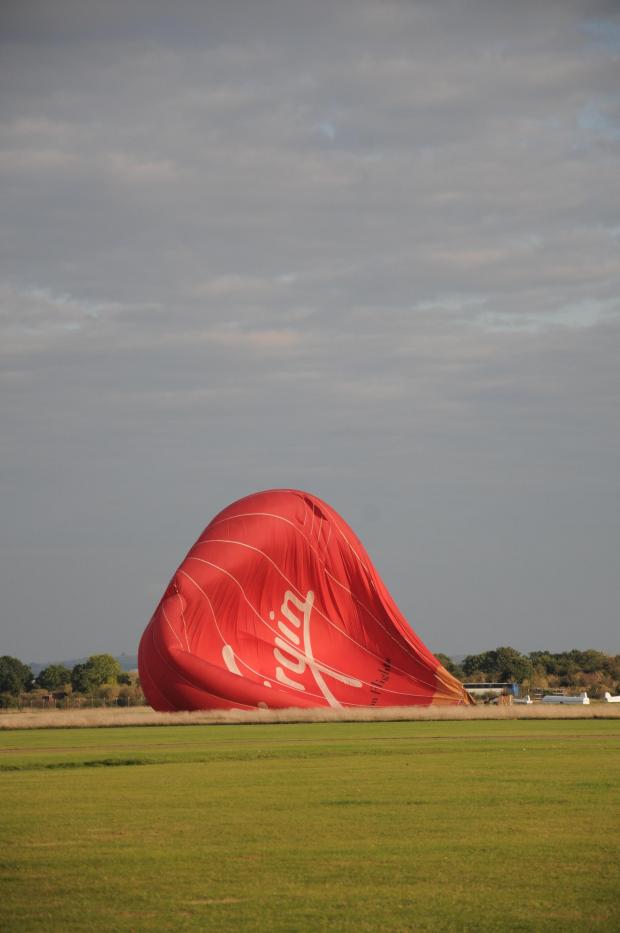 Oxford Mail: Hot air balloon landing at Bicester Aerodrome 